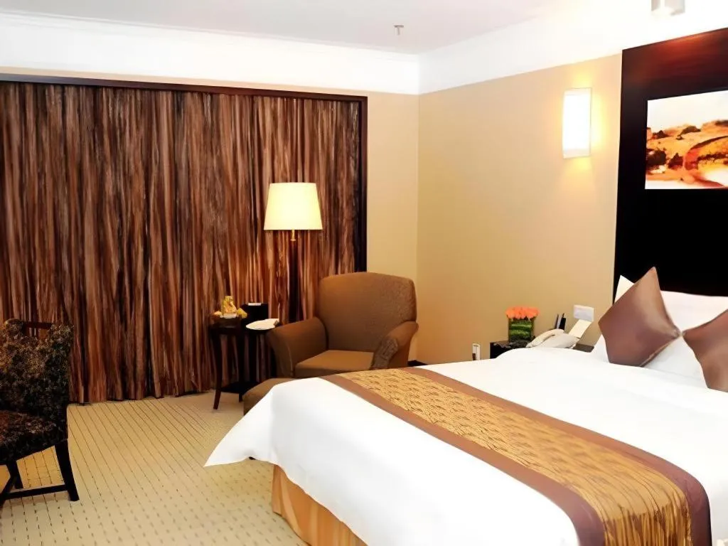 Bed in Qingdao Blue Horizon Hotel Laoshan