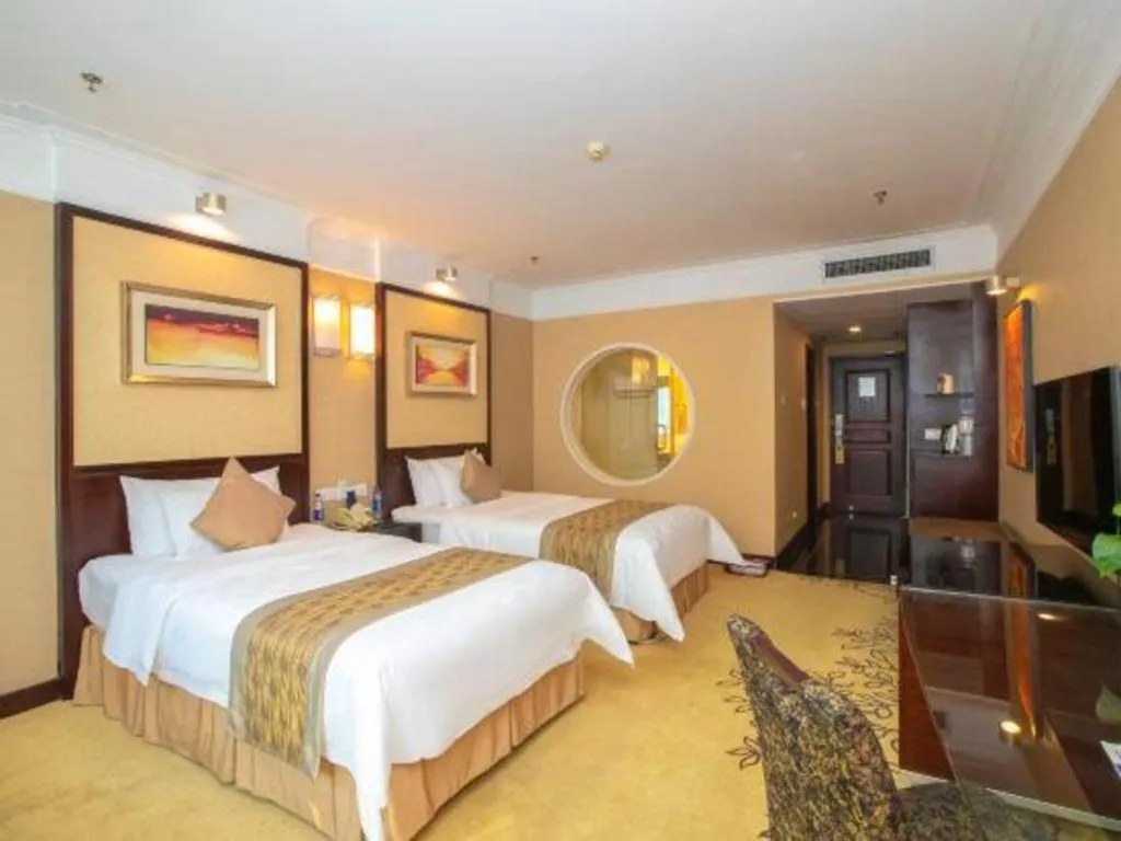 Bed in Qingdao Blue Horizon Hotel Laoshan