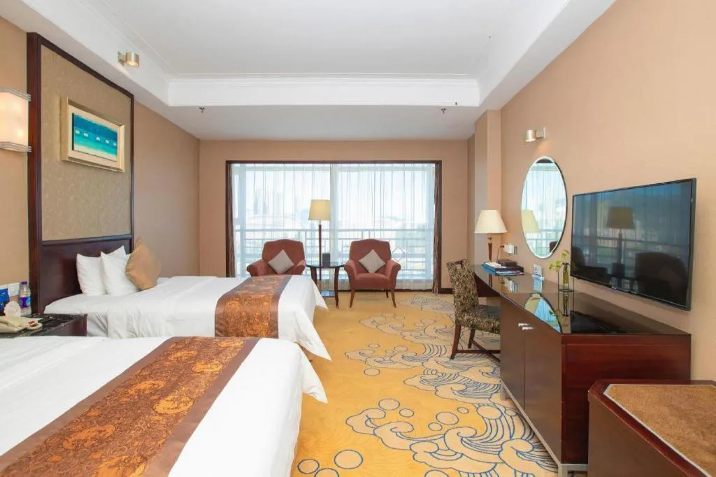 Bed in Qingdao Blue Horizon Hotel Laoshan