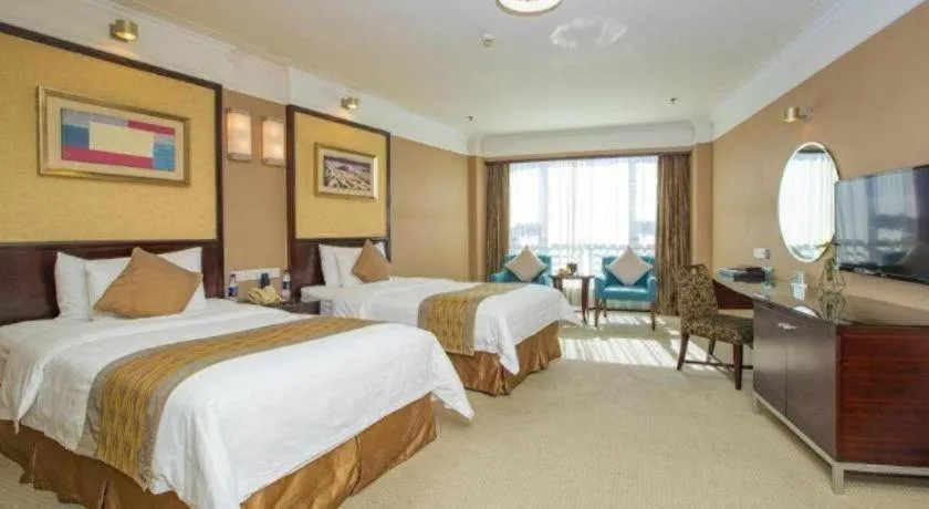 Bed in Qingdao Blue Horizon Hotel Laoshan