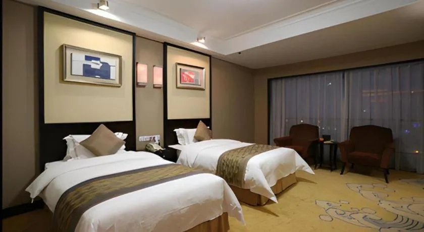 Bed in Qingdao Blue Horizon Hotel Laoshan