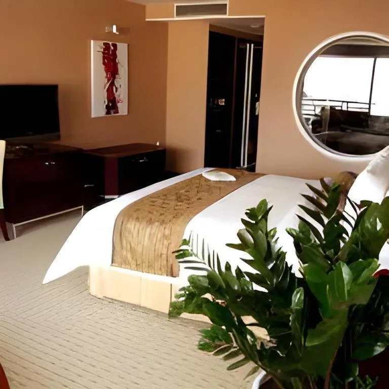 Bed in Qingdao Blue Horizon Hotel Laoshan