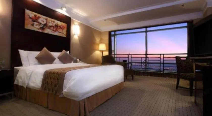 Bed in Qingdao Blue Horizon Hotel Laoshan