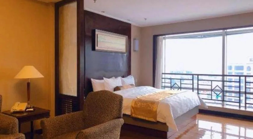 Bed in Qingdao Blue Horizon Hotel Laoshan