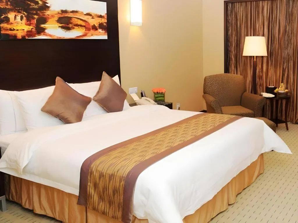 Bed in Qingdao Blue Horizon Hotel Laoshan