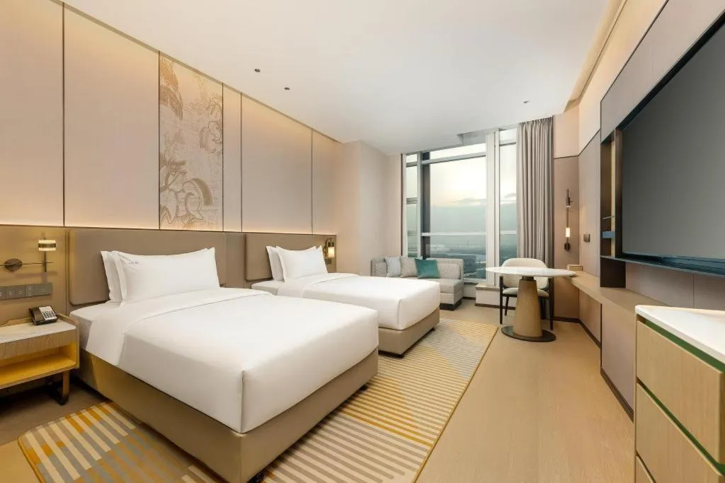 Bed in Holiday Inn Hotel & Suites Jiaxing Hangzhou Bay By IHG