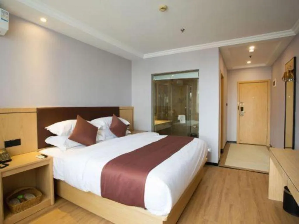 Bed in GYA Hotel Shanghai Songjiang Wanda Plaza