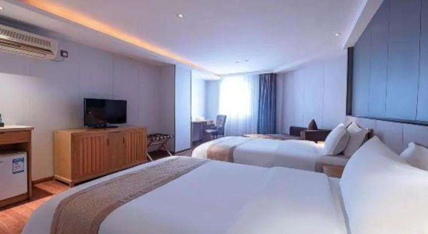 Bed in Zhongshan Louis Hotel