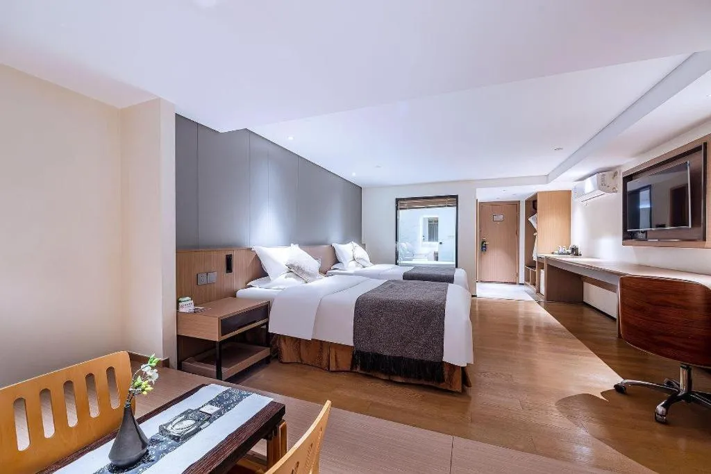 Bed in Zhongshan Louis Hotel