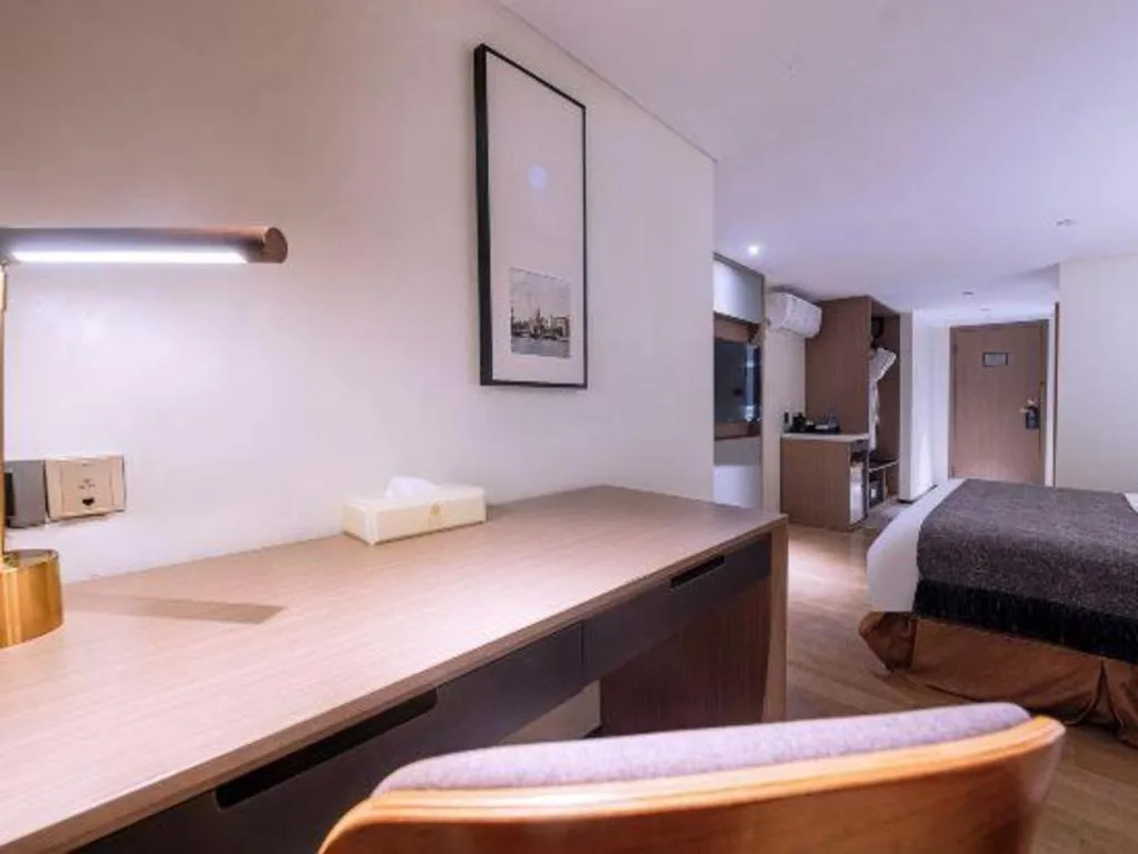 Bed in Zhongshan Louis Hotel