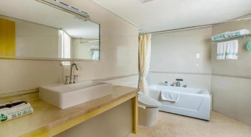 Bed in Zhongshan Louis Hotel