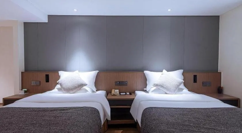 Bed in Zhongshan Louis Hotel