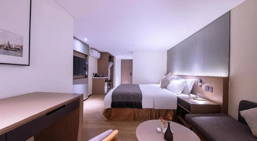 Bed in Zhongshan Louis Hotel