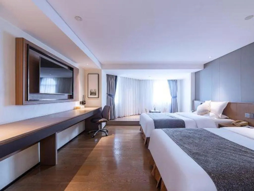 Bed in Zhongshan Louis Hotel