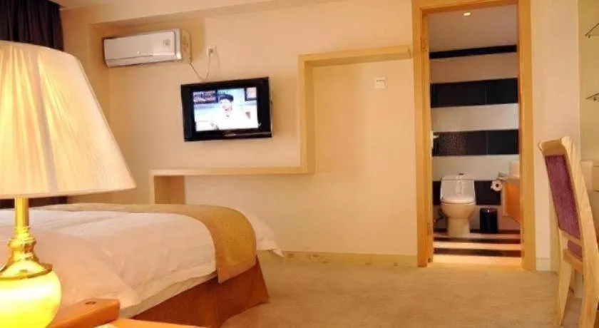 Bed in Zhongshan Louis Hotel