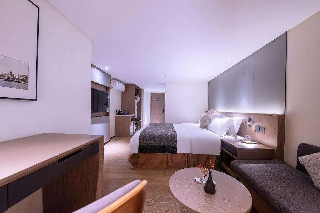 Bed in Zhongshan Louis Hotel