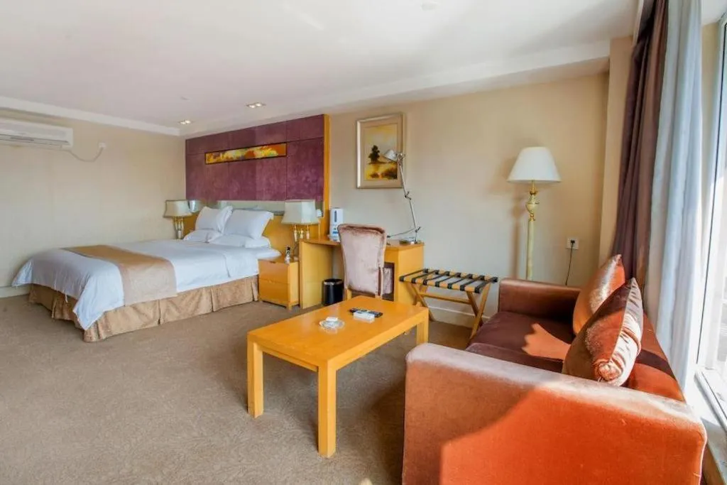 Bed in Zhongshan Louis Hotel