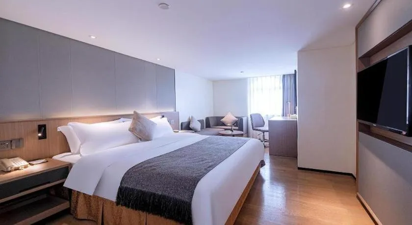 Bed in Zhongshan Louis Hotel