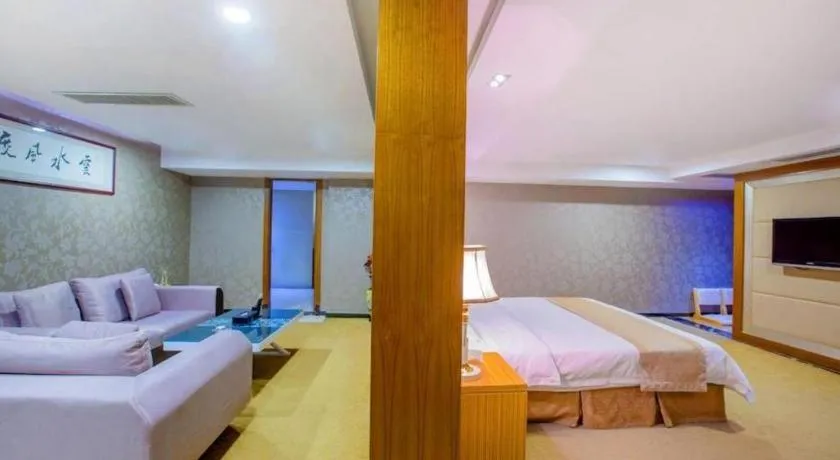 Bed in Zhongshan Louis Hotel