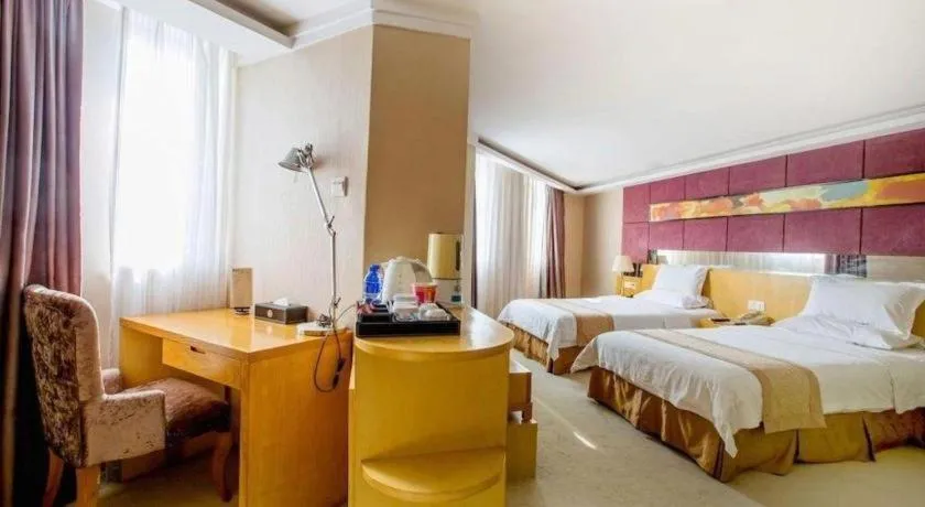 Bed in Zhongshan Louis Hotel