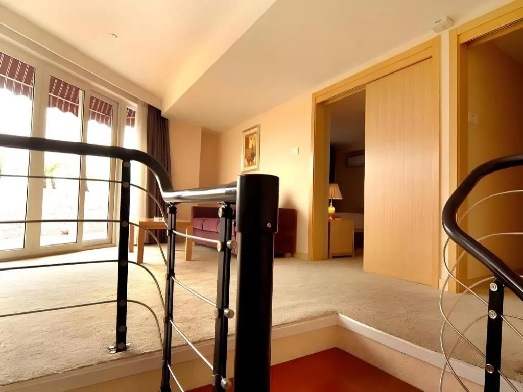 Bed in Zhongshan Louis Hotel