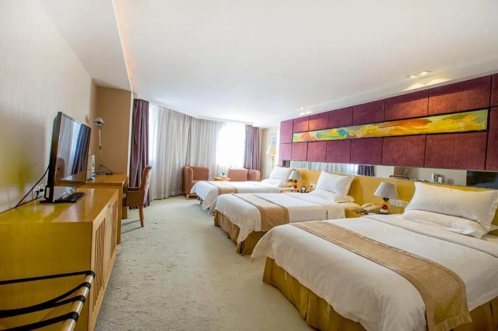 Bed in Zhongshan Louis Hotel