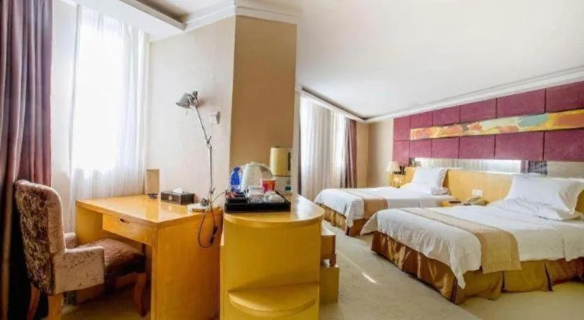 Bed in Zhongshan Louis Hotel