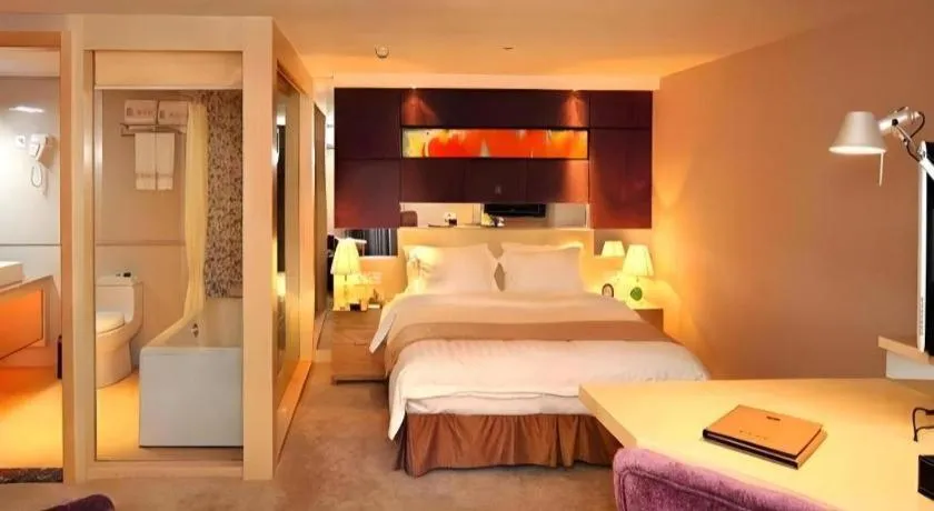 Bed in Zhongshan Louis Hotel