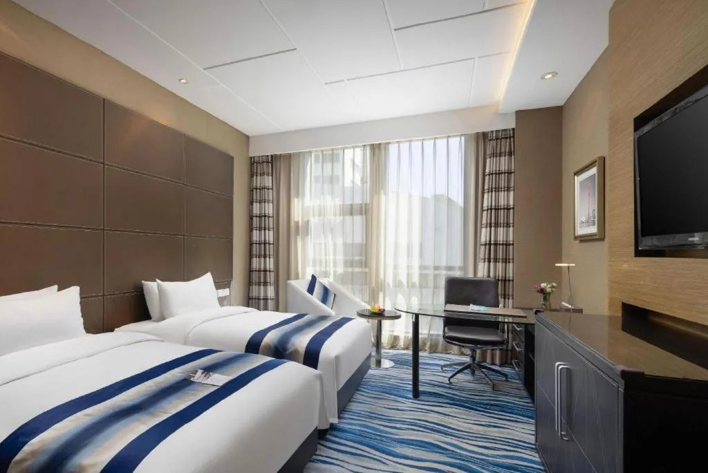 Bed in Brigh Radiance Hotel Yantai