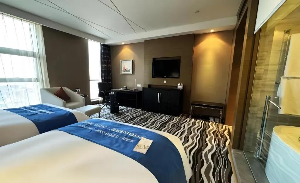 Bed in Brigh Radiance Hotel Yantai