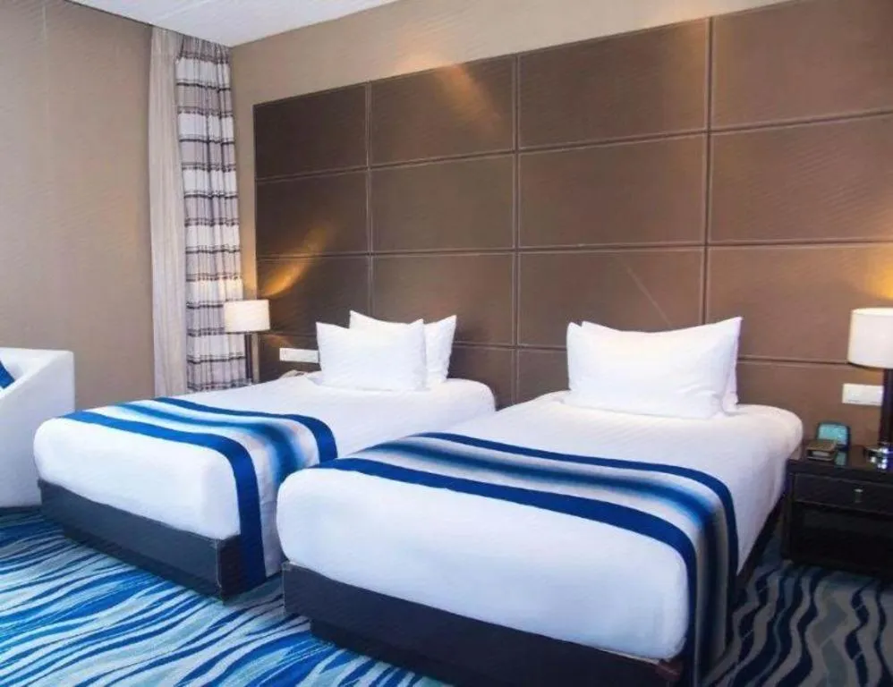 Bed in Brigh Radiance Hotel Yantai