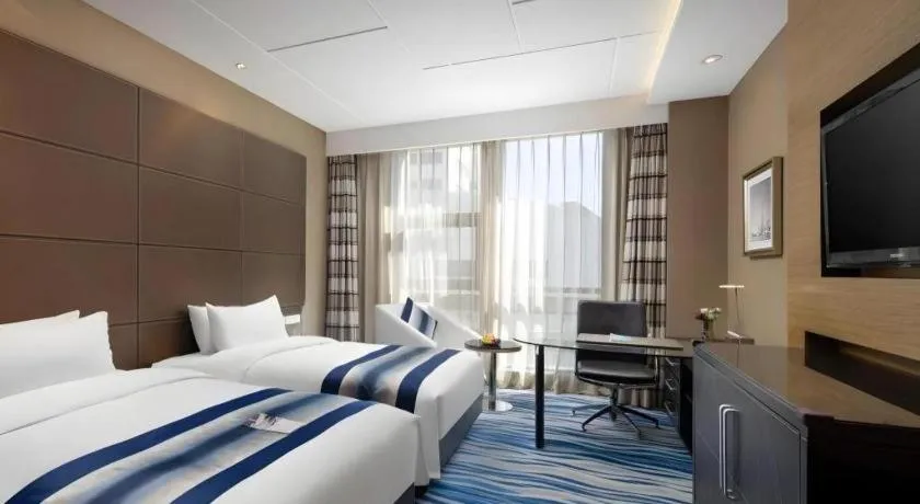 Bed in Brigh Radiance Hotel Yantai