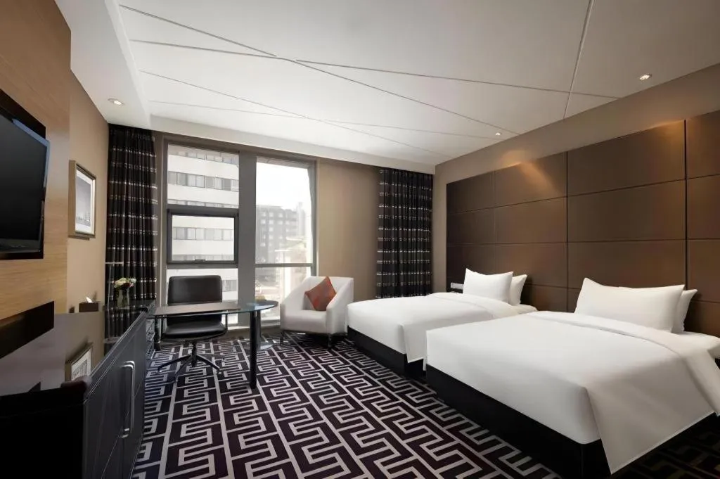 Bed in Brigh Radiance Hotel Yantai