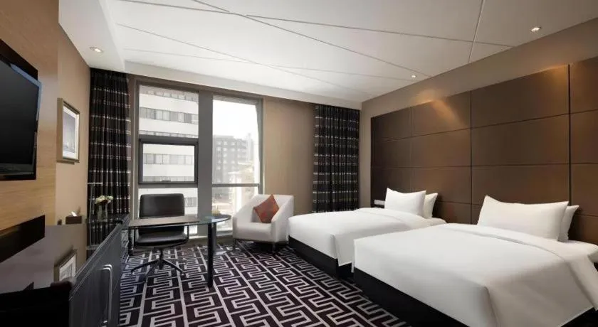 Bed in Brigh Radiance Hotel Yantai