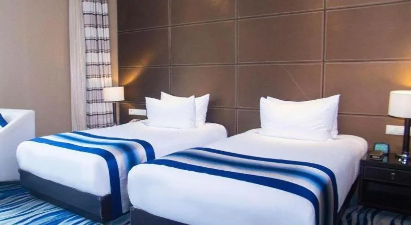 Bed in Brigh Radiance Hotel Yantai