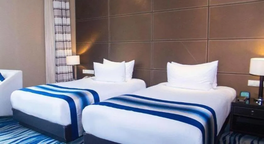 Bed in Brigh Radiance Hotel Yantai