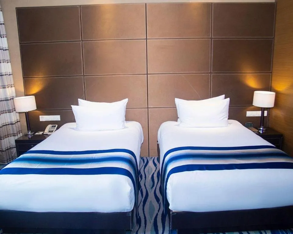 Bed in Brigh Radiance Hotel Yantai