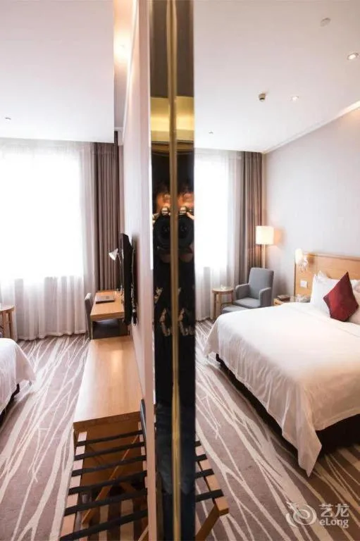 Bed in Zhangjiagang Jiangnan Garden Hotel