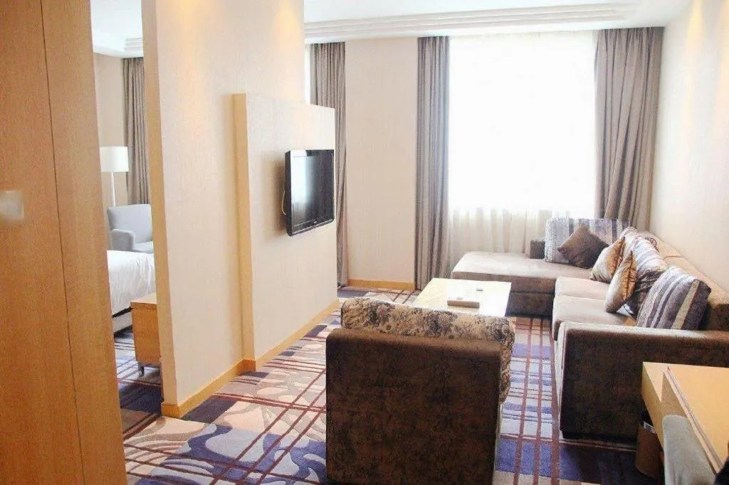 Bed in Zhangjiagang Jiangnan Garden Hotel