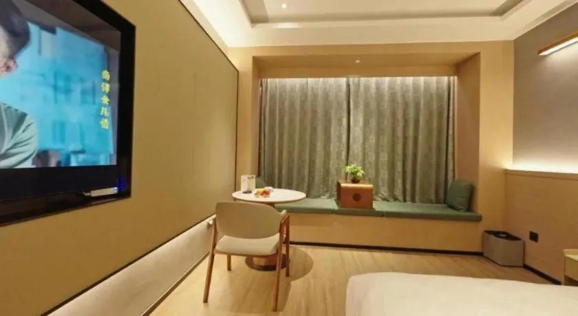 Bed in Zhangjiagang Jiangnan Garden Hotel