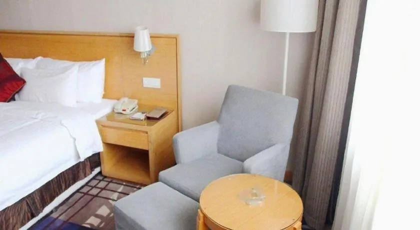 Bed in Zhangjiagang Jiangnan Garden Hotel