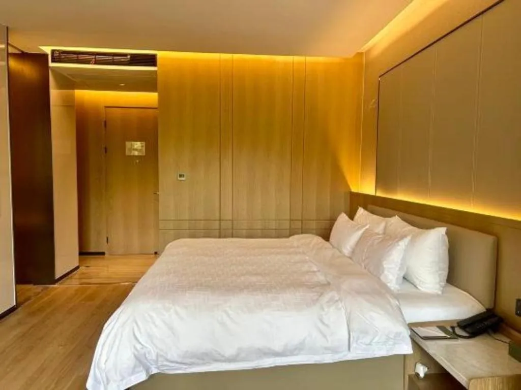 Bed in Zhangjiagang Jiangnan Garden Hotel