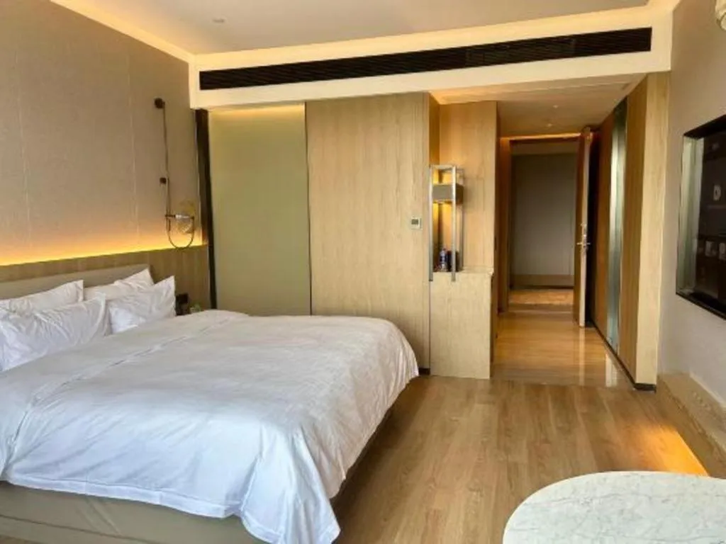 Bed in Zhangjiagang Jiangnan Garden Hotel