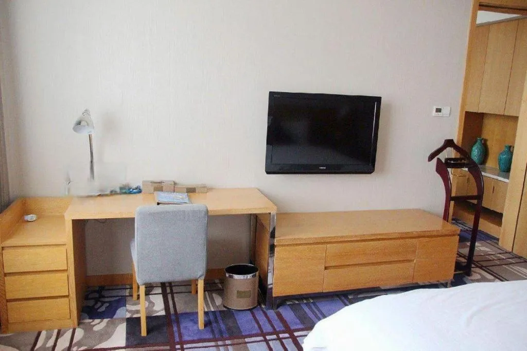 Bed in Zhangjiagang Jiangnan Garden Hotel