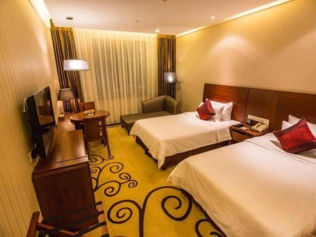 Bed in Zhangjiagang Jiangnan Garden Hotel