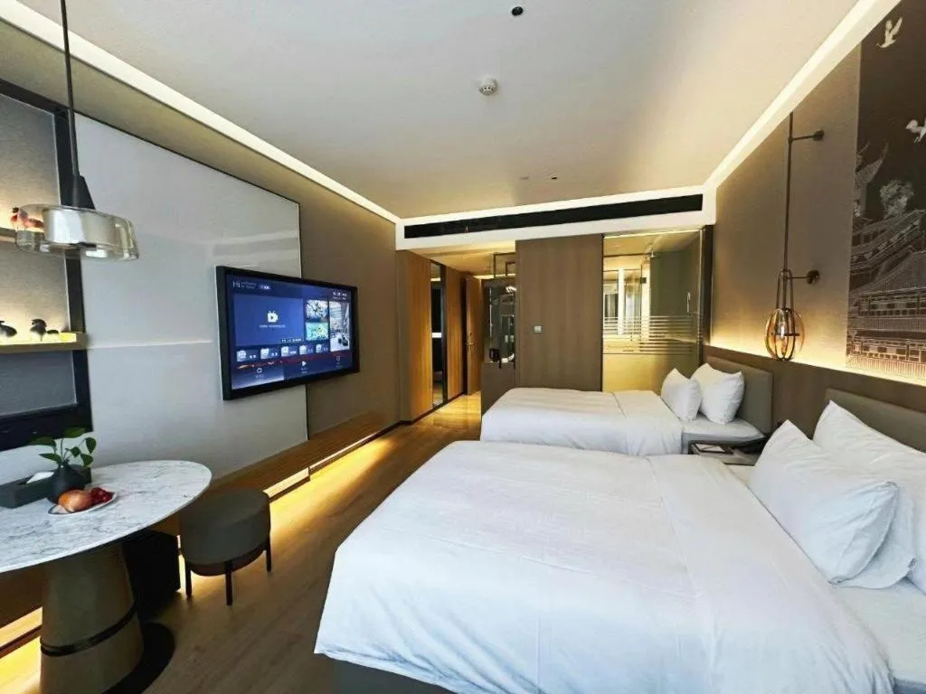 Bed in Zhangjiagang Jiangnan Garden Hotel