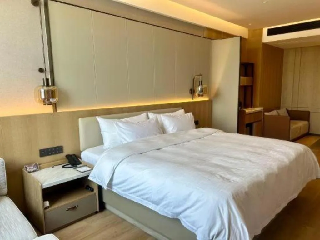 Bed in Zhangjiagang Jiangnan Garden Hotel