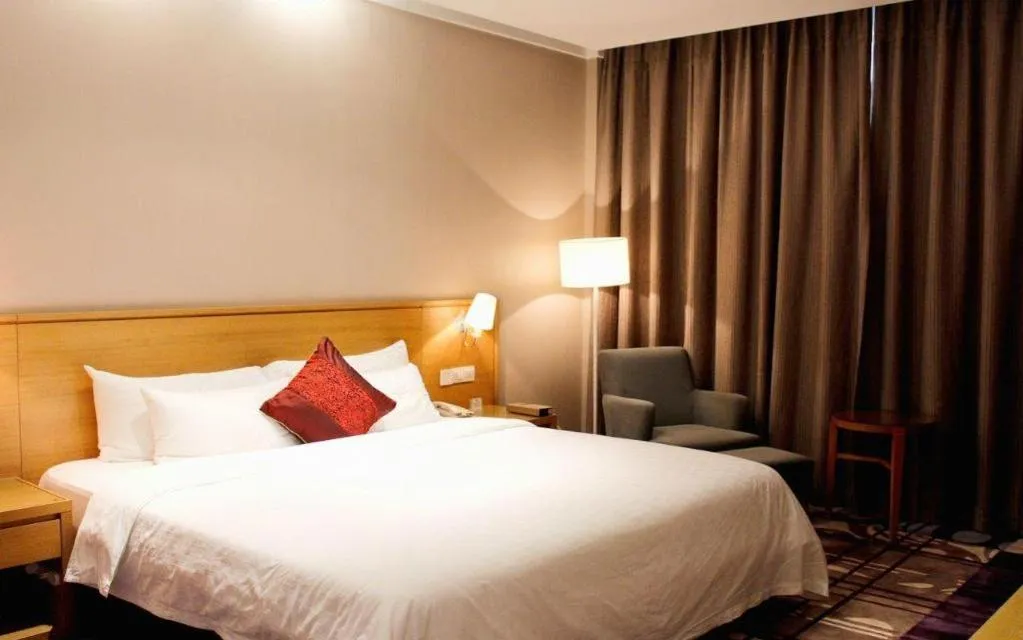 Bed in Zhangjiagang Jiangnan Garden Hotel