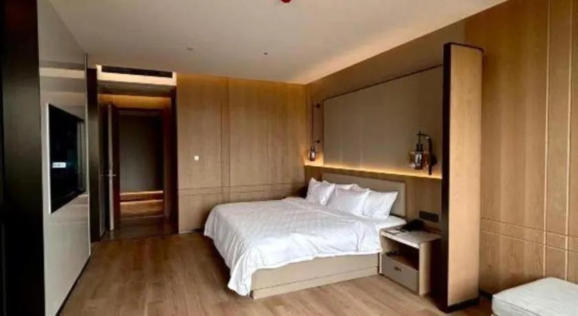 Bed in Zhangjiagang Jiangnan Garden Hotel