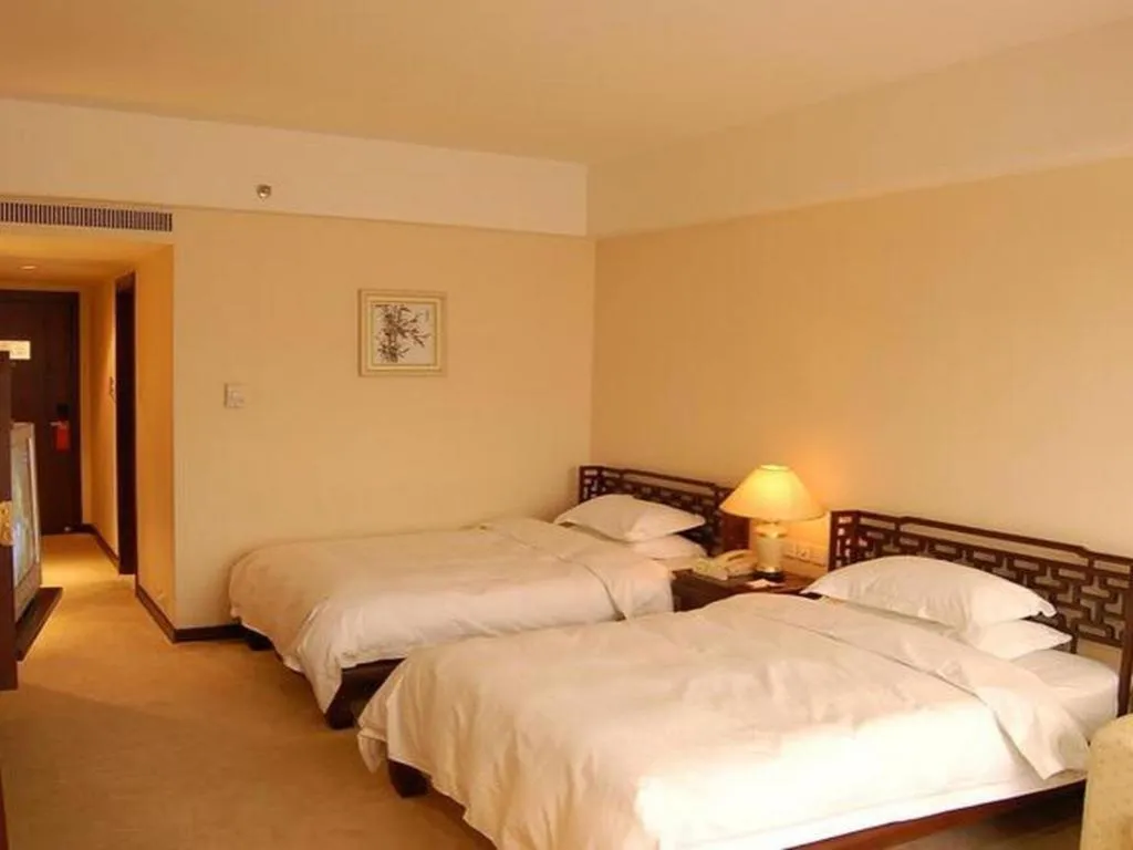 Bed in Zhangjiagang Jiangnan Garden Hotel